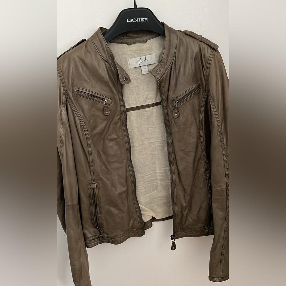 Women’s light brown leather jacket